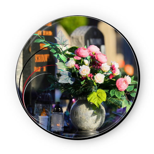 entretien de tombes avec un vase fleuri.